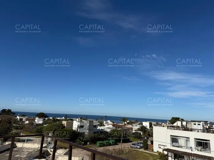 Departamento dos dormitorios en Manantiales en Alquiler con vista al mar y terraza.