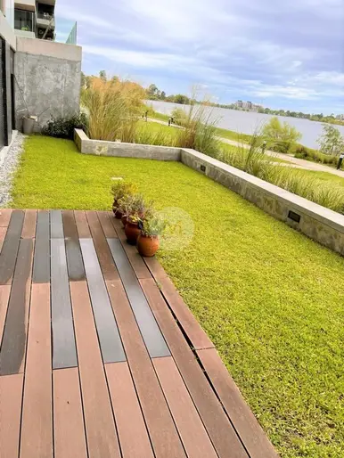 VENTA CON RENTA apartamento planta baja 3 dormitorios en Lago Mayor Carrasco
